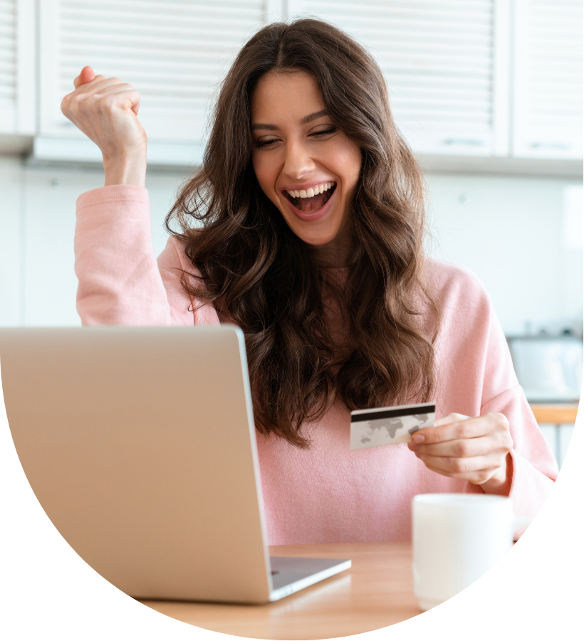 Woman celebrating a purchase on internet